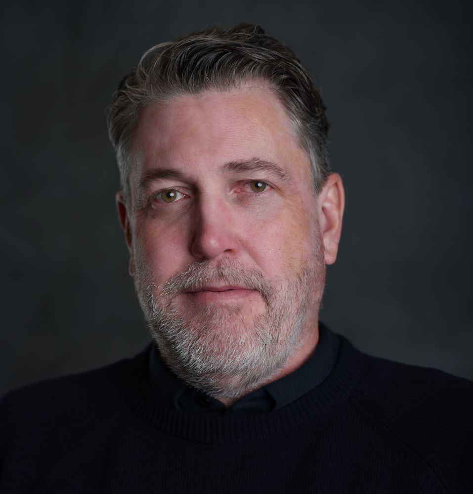 new headshot compressed.jpg